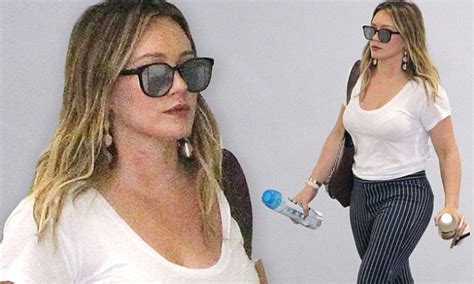 hilary duff carries two drinks in beverly hills daily
