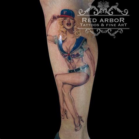 pin up tattoo by cory claussen tattoos