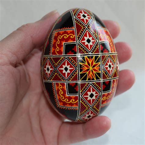 ukrainian goose egg pysanky striking colors expert lines yellow orange