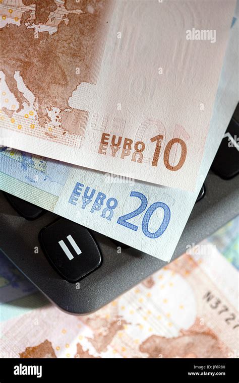 euro notes   calculator stock photo alamy
