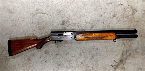 checked   bucket list gun finally  browning  chopped   extended mag tube