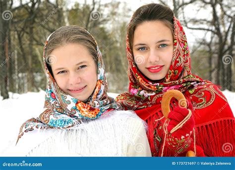 fashion in russian style two beautiful smiling girls in traditional