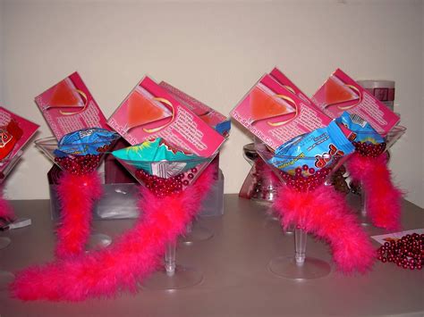 bachelorette party favors mini boa wrapped around a martini glass filled with a ring pop