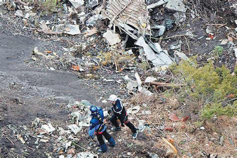 french investigators sift through wreckage on march 25 for