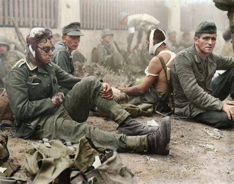 wounded german soldiers   pows  american troops
