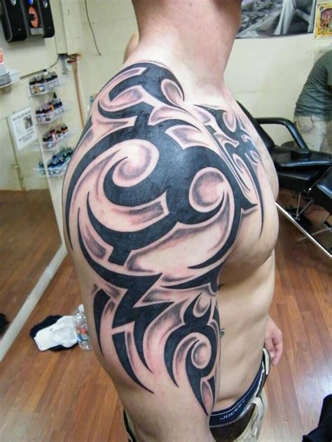 shoulder tattoos  men  tribal designs  arm chest neck tattoo ideas