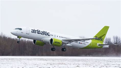 airbaltic unveils updated livery   delivered airbus  international flight network