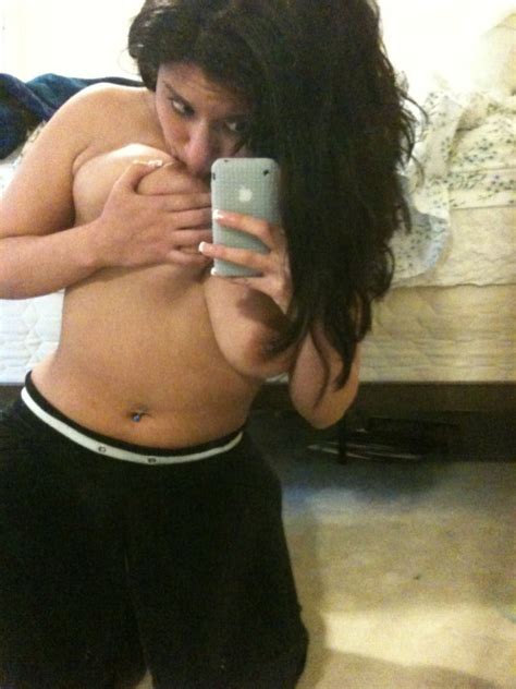 indian chubby girl taking selfie of big boobs