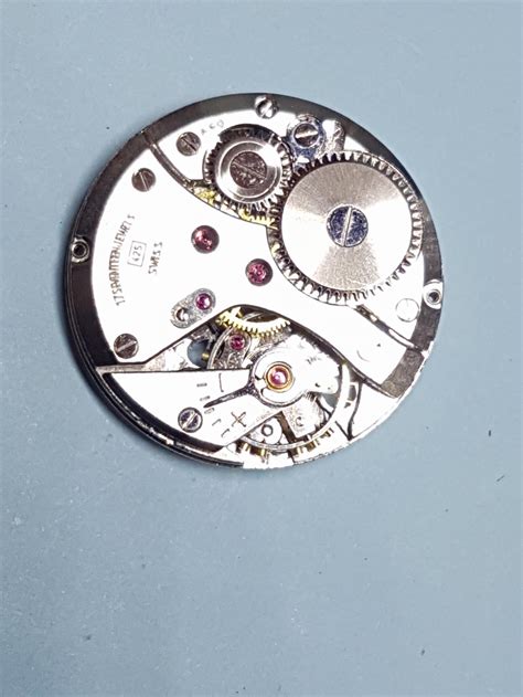 how to replace a broken balance cock jewel spring in vintage rotary watch repairs help