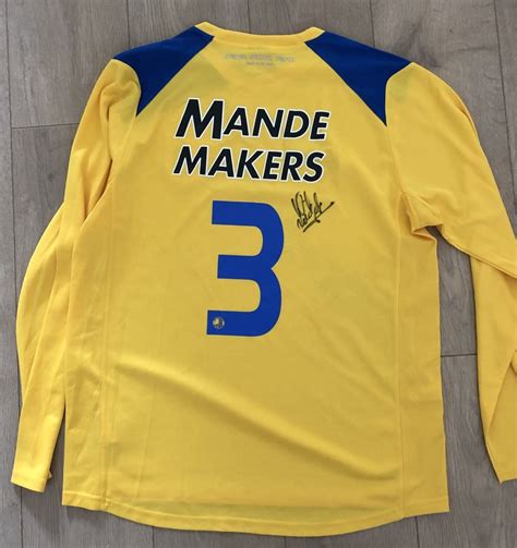 rkc waalwijk home football shirt   sponsored  mande makers keukens