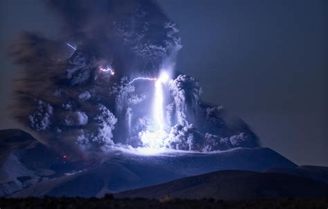 lightning bolt strikes erupting volcano  extraordinary image