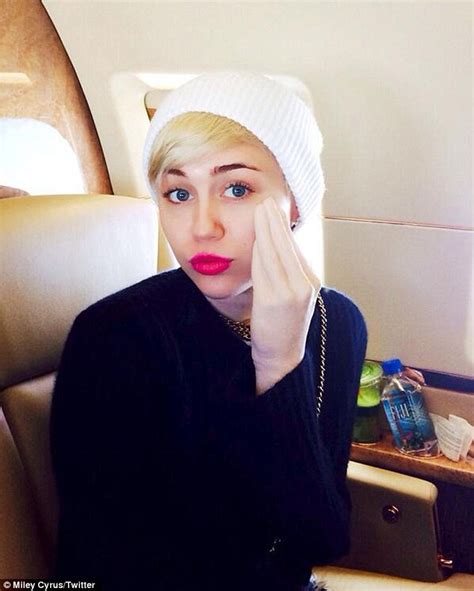 miley cyrus displays flawless complexion on private jet daily mail online