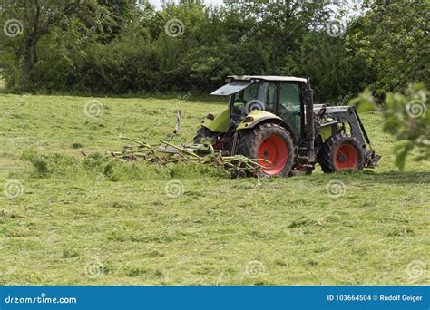 haying tractor editorial stock image image  crop