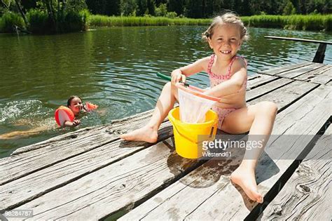 portrait  girl  fishing net   premium high res pictures getty images