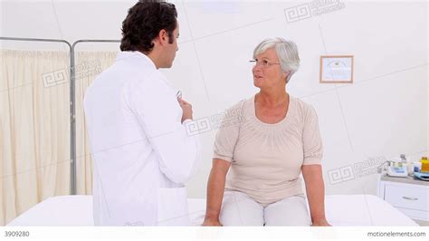 Serious Mature Woman Being Examined Stock Video Footage
