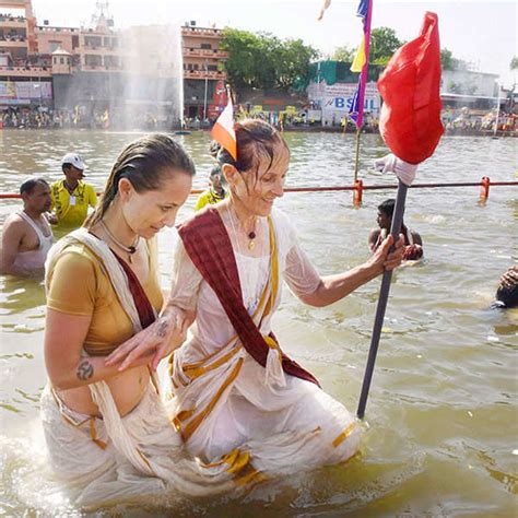 Foreign Devotees Taking Bath In Kshipra River On The