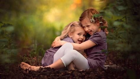 girl children hugging smiling depth  field wallpapers hd desktop  mobile backgrounds