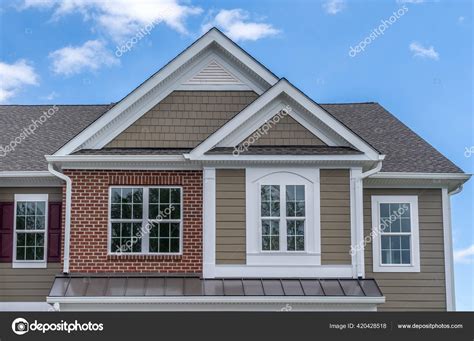 reverse double gable close luxury single family residential home square stock photo