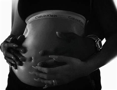 Khloé Kardashian Announces Pregnancy Wearing Calvin Klein Bra Ad