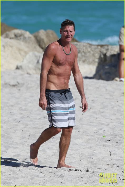extreme makeover s ty pennington goes shirtless puts