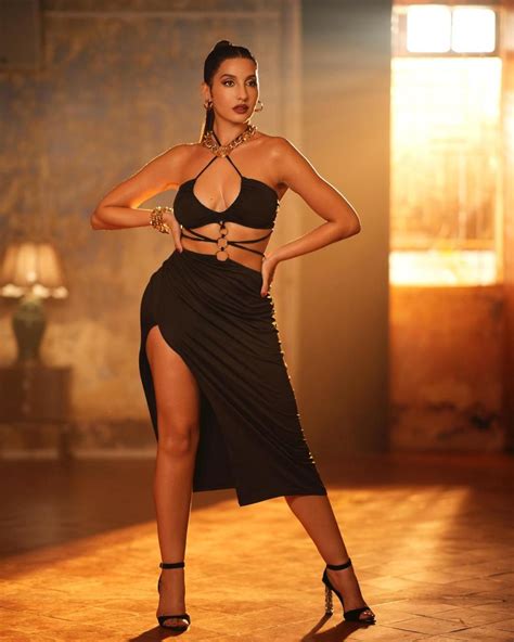 In Pics Nora Fatehi Drops Jaws In Black Cut Out Dress From Teaser Of