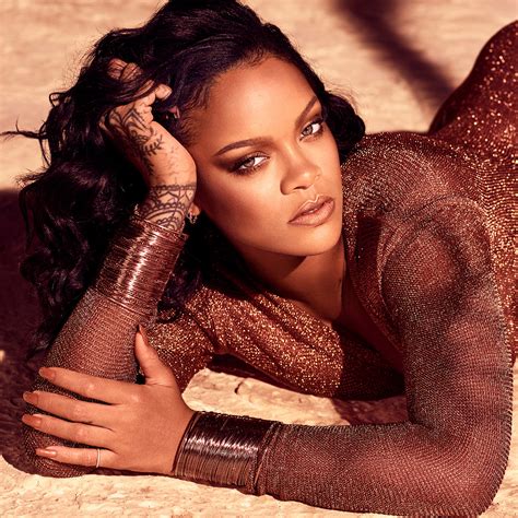 rihanna oozes sex appeal as she crawls on the floor in low cut leotard for new fenty bronzer