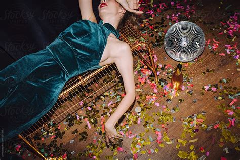 Woman Lying Drunk After Party By Stocksy Contributor Lumina Stocksy