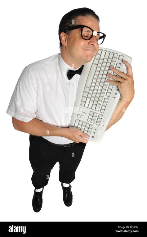 nerd lovingly holding keyboard isolated  white background stock photo alamy