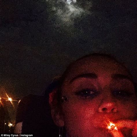 Miley Cyrus Turns Heads With Smoke Print Outfit And Rainbow Dreadlocks