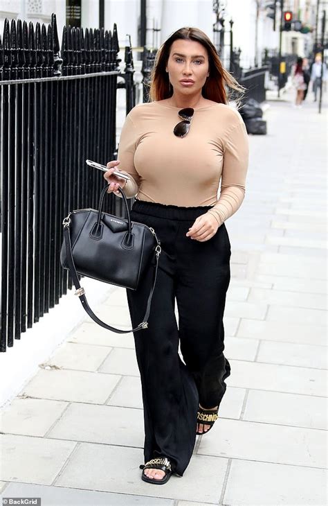 lauren goodger shows off curves and peachy derriere in a clingy outfit