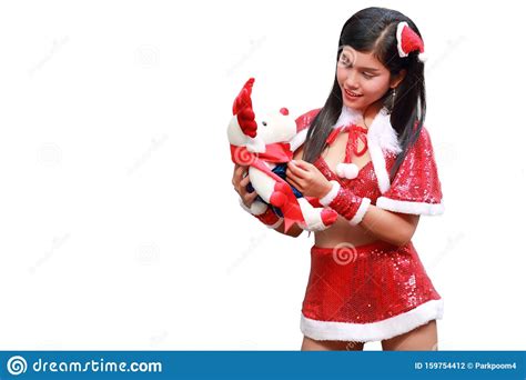 beautiful and santa girl with christmas ts on hands isolated and