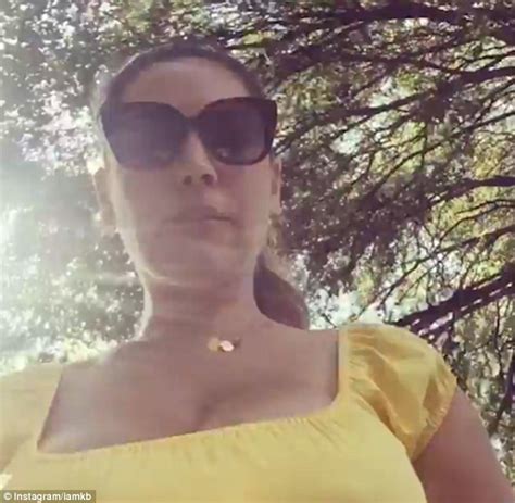 kelly brook shows off her assets in yellow top cycling through rome