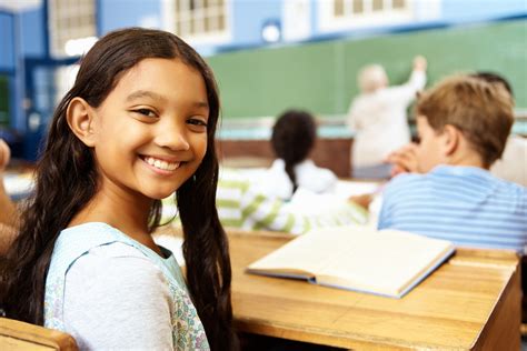 elementary student smiling  classroom nnpa essa media campaign