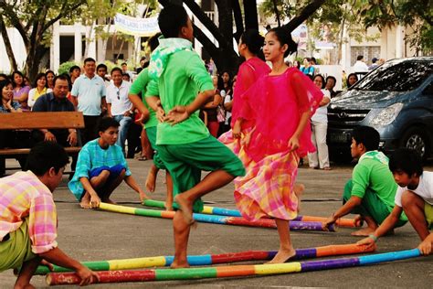 tinikling  national dance   philippines  bamboo poles filipino culture
