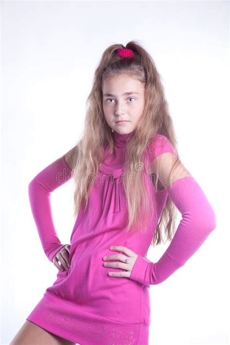 Teen Girl In A Pink Dress Posing Royalty Free Stock Image Image 24170236