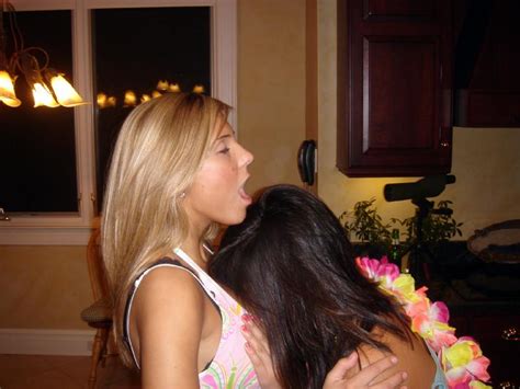burying her face in the blonde s cleavage porno fotos