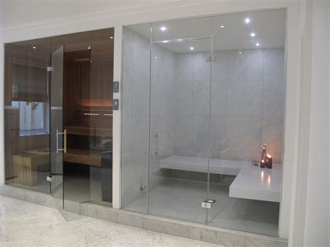 stylish steam room  white corian benches  large format tiles