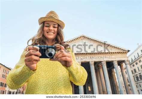 portrait happy young woman checking  stock photo