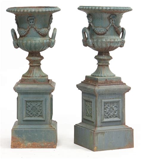 pair  cast iron garden urns  pedestals sold  garden urns