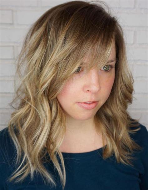 Mid Length Wavy Hairstyle With Bangs Side Bangs