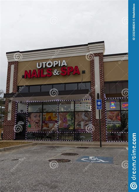 utopia nails  spa exterior building  lights editorial stock