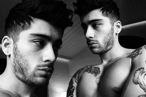 zayn malik is looking very buff as he shows off his muscular physique