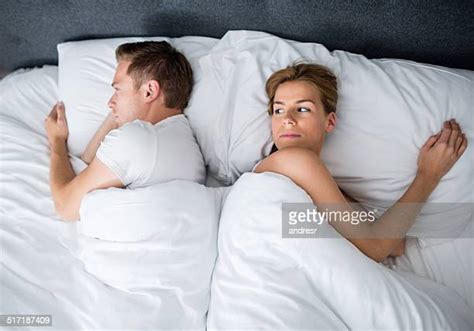 Frustrated Woman Sleeping Man Photos And Premium High Res Pictures