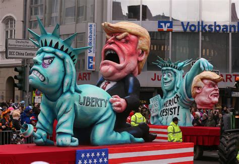 German Parade Float Shows Trump Raping Statue Of Liberty Before Losing