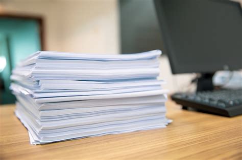 premium photo pile   paper  office desk stacked