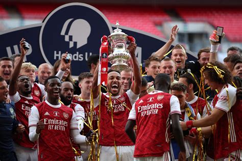 pictures arsenal lift fa cup trophy  empty wembley stadium  beating chelsea london