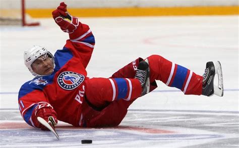 strongman vladimir putin falls during ice hockey game in russia s sochi