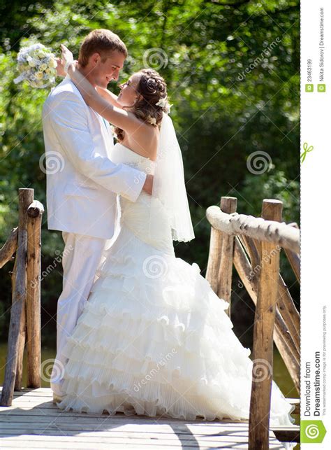 Wedding Happy Bride And Groom Kissing Stock Image
