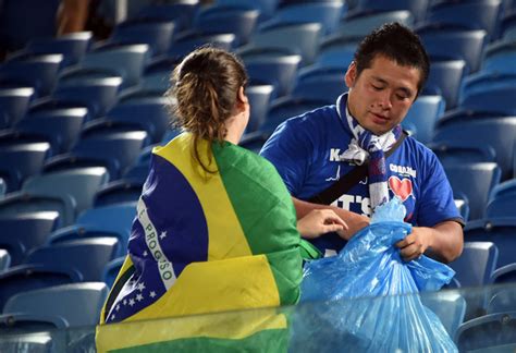 best fans at world cup japanese clean up stadium after team s matches photos — rt world news