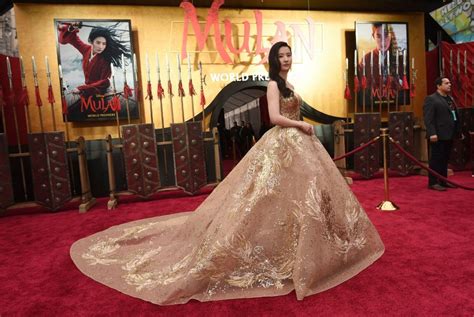 yifei liu shines at the premiere of mulan in los angeles 16 photos
